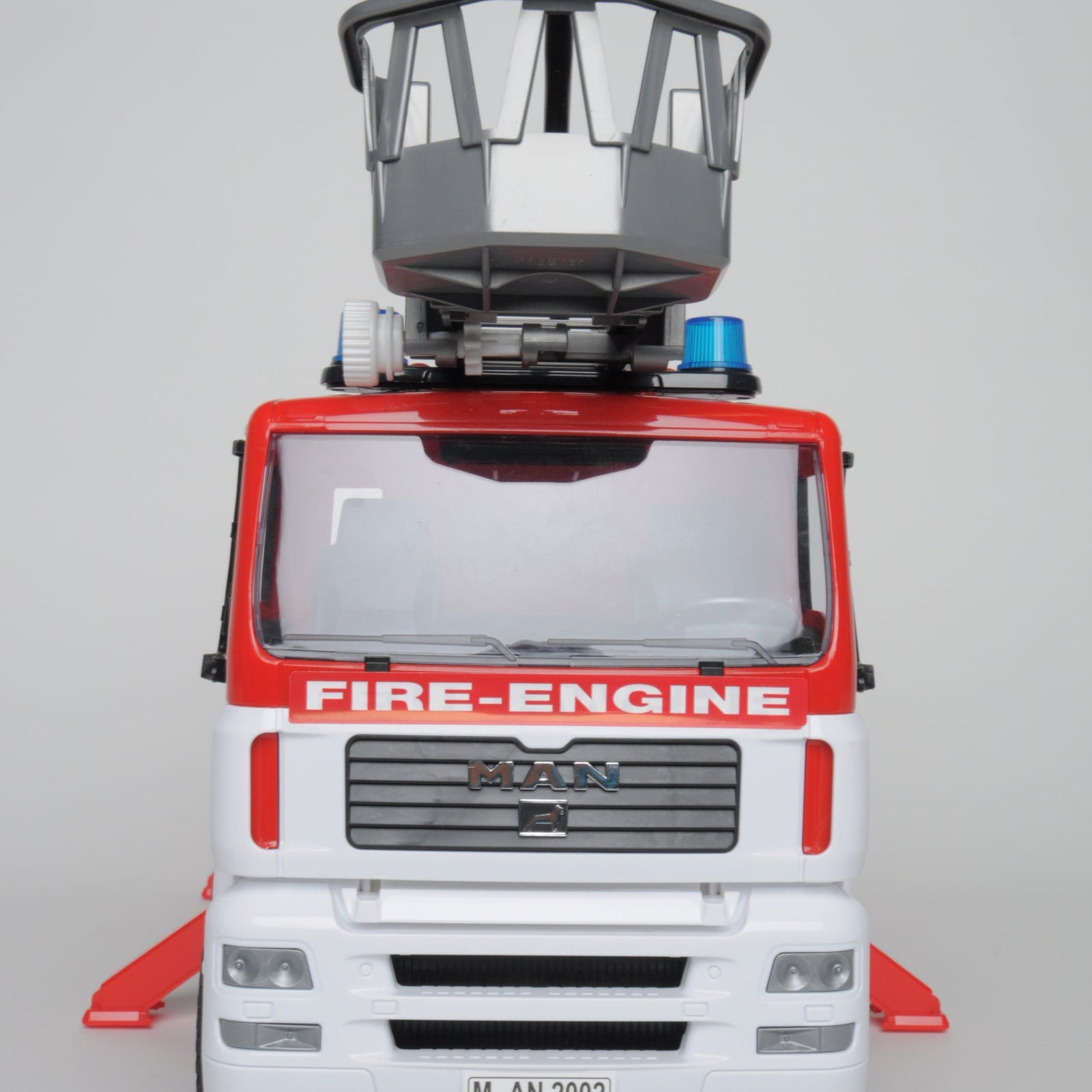 Bruder Man Fire Engine with Ladder toy truck, detailed red fire rescue vehicle with extendable ladder and realistic design.