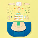 DIY basketball catapult kit by KiwiCo featuring colorful components and assembled catapult ready for STEM-based play.