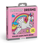 Baby enjoying the Unicorn Dreams Color Magic Bath Book by Mudpuppy with colorful unicorn illustrations in the bath.
