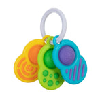 Colorful baby teething ring with different textures on a white background