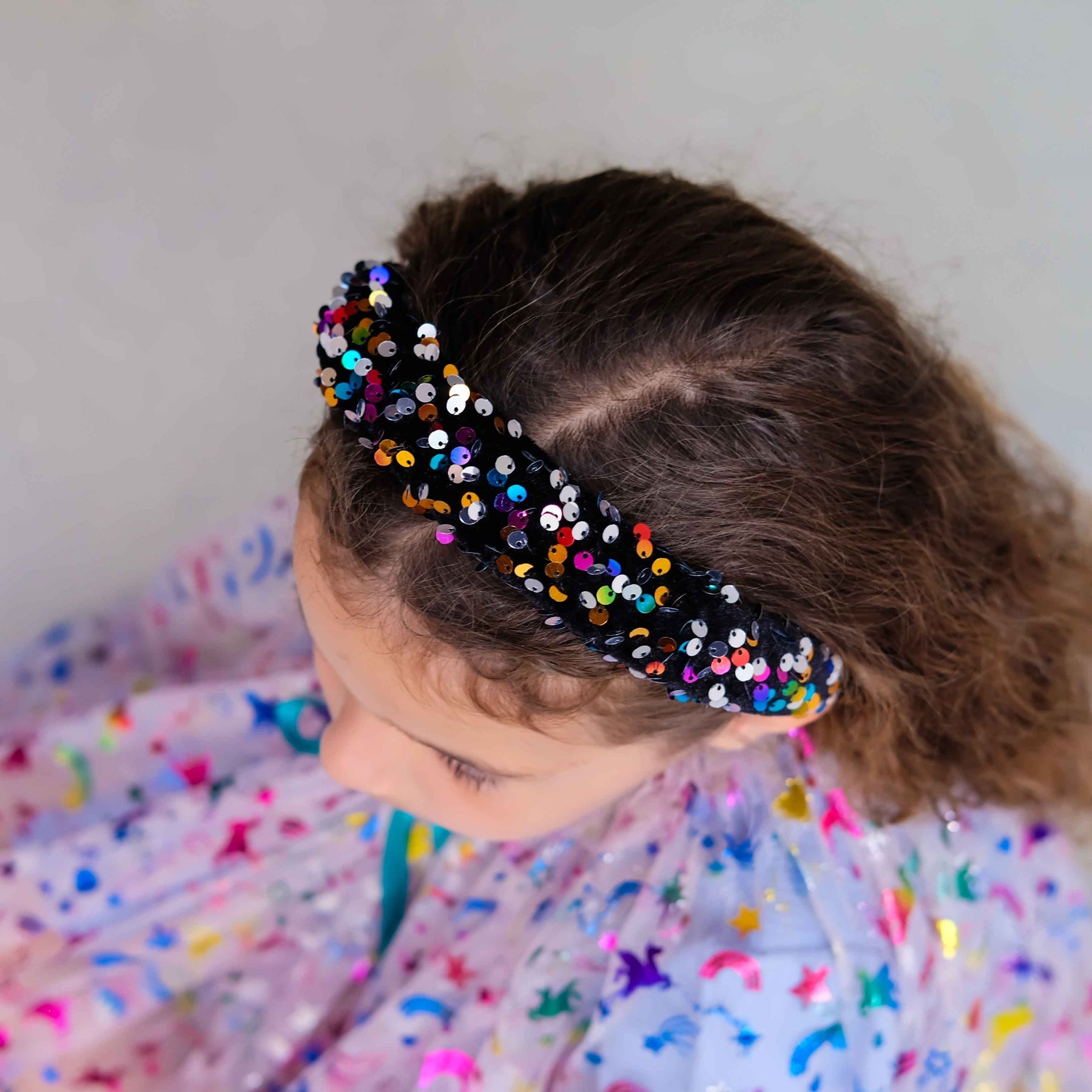 Shiny Dazzle Sequin Handband by Mimi & Lula, featuring sparkling sequins on a stylish accessories headband.