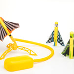 Stomp Rocket Stunt Planes outdoors, colorful foam planes ready for launching and stunt flying in the yard.