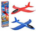 Colorful Stunt Flyer Sky Glider outdoor toy by The Toy Network flying through the sky against a blue background.