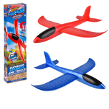 Colorful Stunt Flyer Sky Glider outdoor toy by The Toy Network flying through the sky against a blue background.