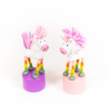 Colorful unicorn push puppets, animal figurines by Jack Rabbit Creations, featuring bright designs and flexible push features.