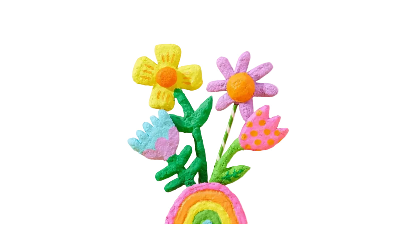 Colorful felt flowers and rainbow on a white background
