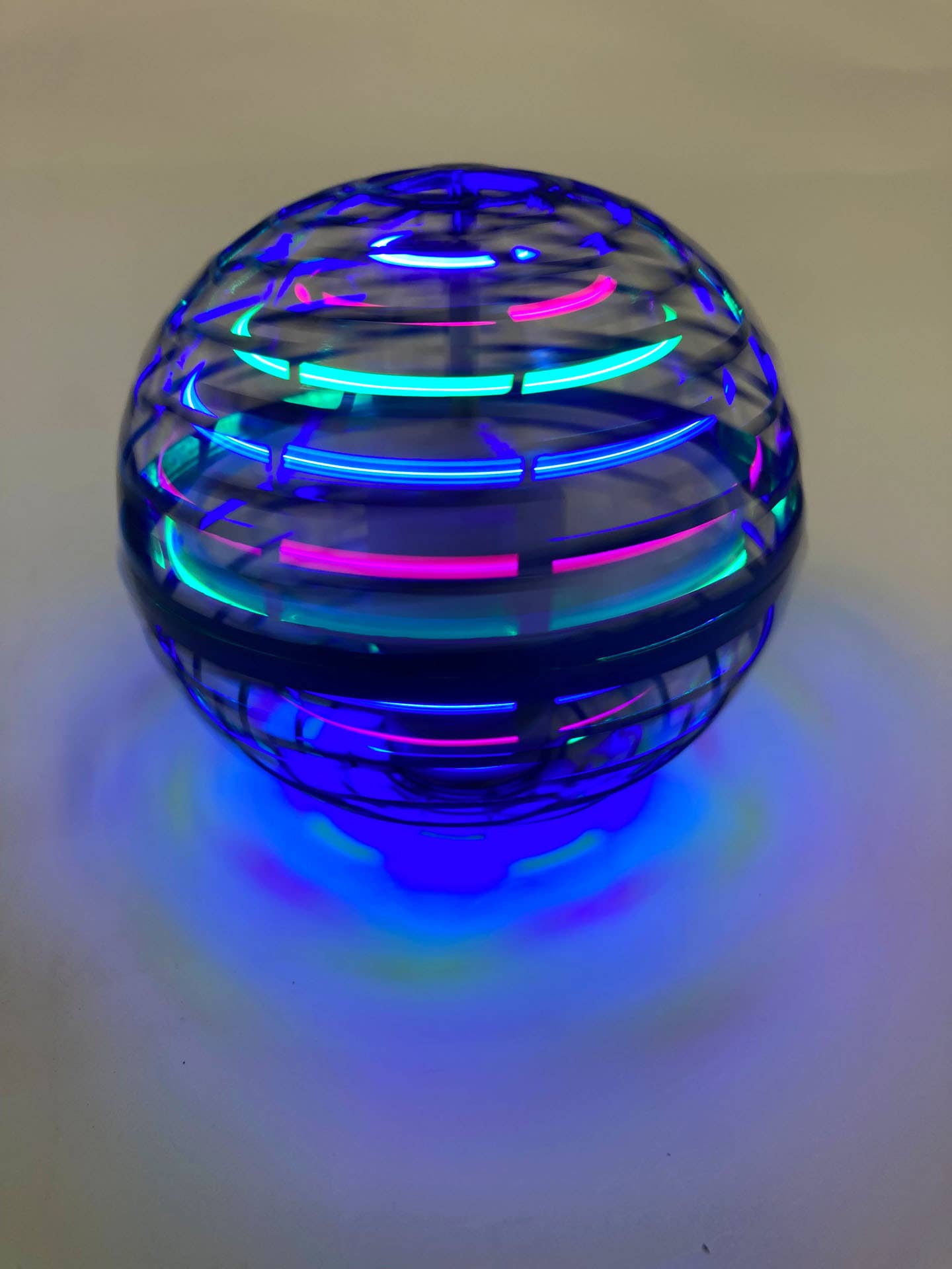 HQ Kites & Designs RC Aerosphere Flying Orb toy with colorful, spherical design and remote control for outdoor play.