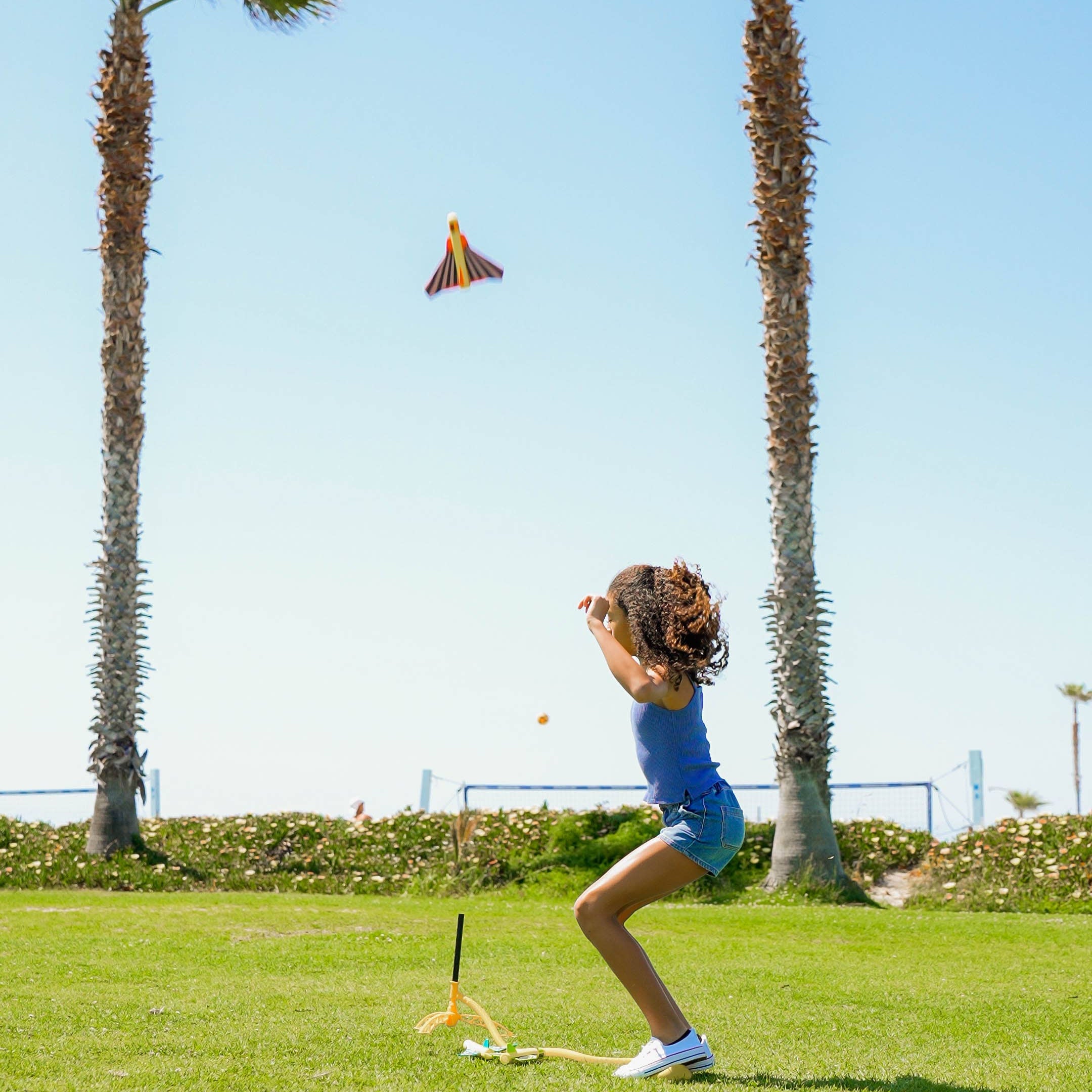 Stomp Rocket Stunt Planes outdoors, showcasing colorful foam planes ready for launching and stunt flying.