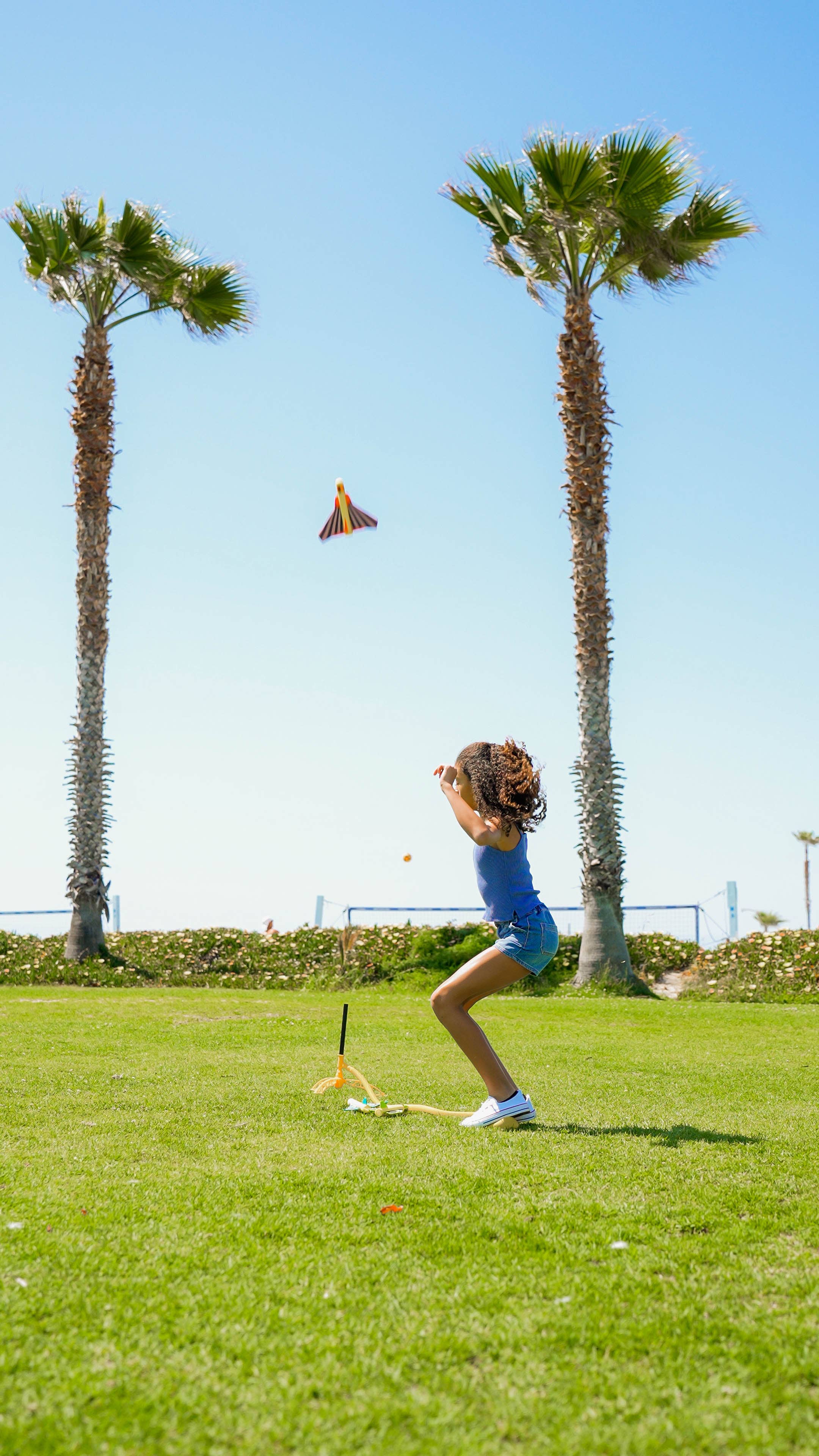 Stomp Rocket Stunt Planes outdoors, showcasing colorful foam planes ready for launching and stunt flying.