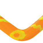 Toysmith outdoor boomerang flying through the air against a clear sky, showcasing its curved design and vibrant colors.