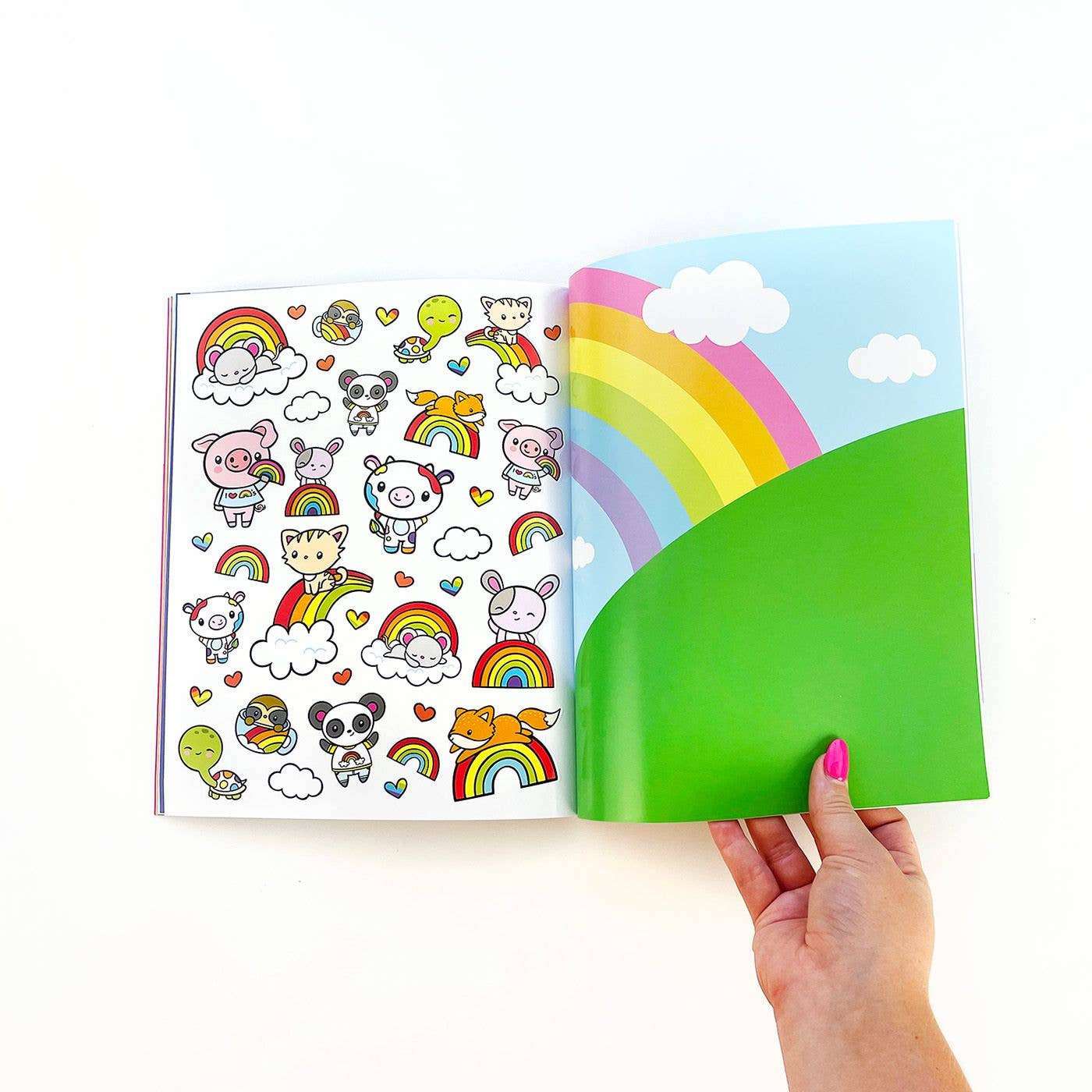 Draw-Along Rainbow Sticker Book by Pipsticks featuring colorful sticker pages and fun rainbow-themed designs for kids.
