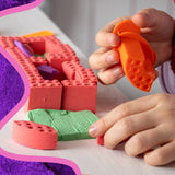 Yellow Mad Mattr Quantum Pack sensory toy, soft and moldable modeling clay from Mad Mattr for tactile play and creative fun.