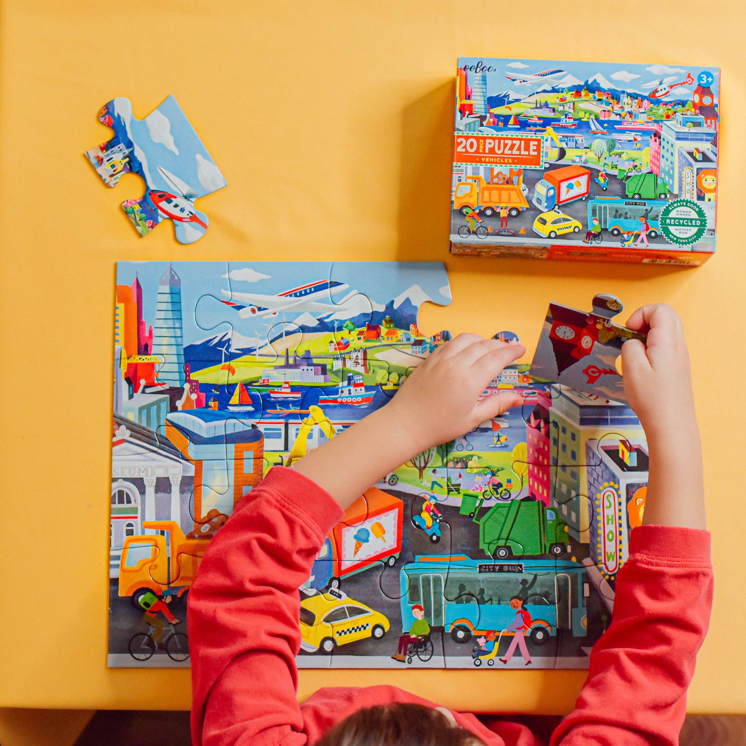 Colorful eeBoo Vehicles 20 Piece Puzzle featuring cars, trucks, and buses for children to assemble and enjoy.
