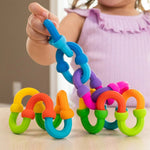 Colorful Plip Links building set by Fat Brain Toy Co. with interconnected plastic links for creative construction and play.