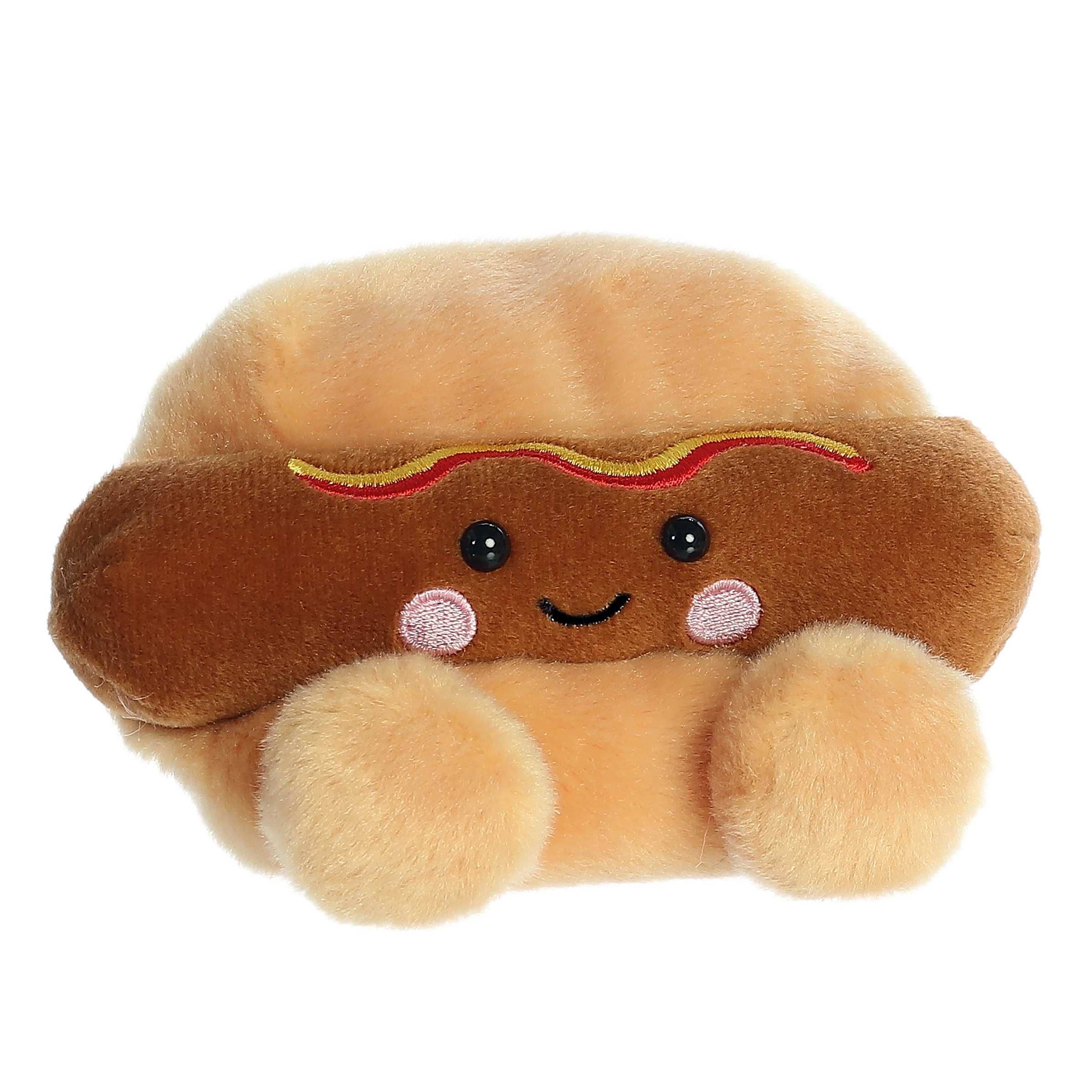 Soft Hot Dog Palm Pal plush toy from Palm Pals featuring a cute, cuddly hot dog character with a smiling face and plush fabric.