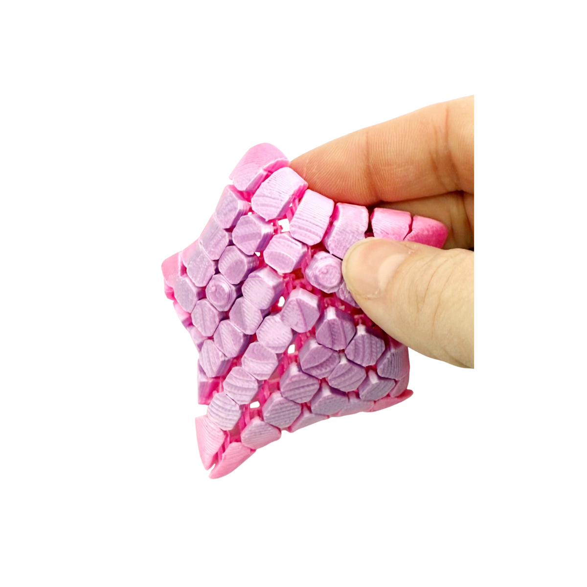 Small floppy 3D printed fidget assortment by pyegames featuring colorful, squishy, and flexible silicone fidget toys.