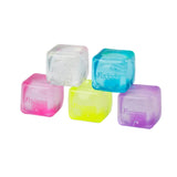 Five translucent gel cubes in pink, clear, blue, yellow, and purple, each embossed with the brand name 'Jado's', arranged on a white background.