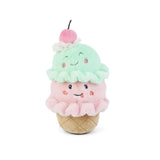 Soft plush toy shaped like an ice cream scoop from Mon Ami, featuring colorful, textured fabric and a cute, rounded design.