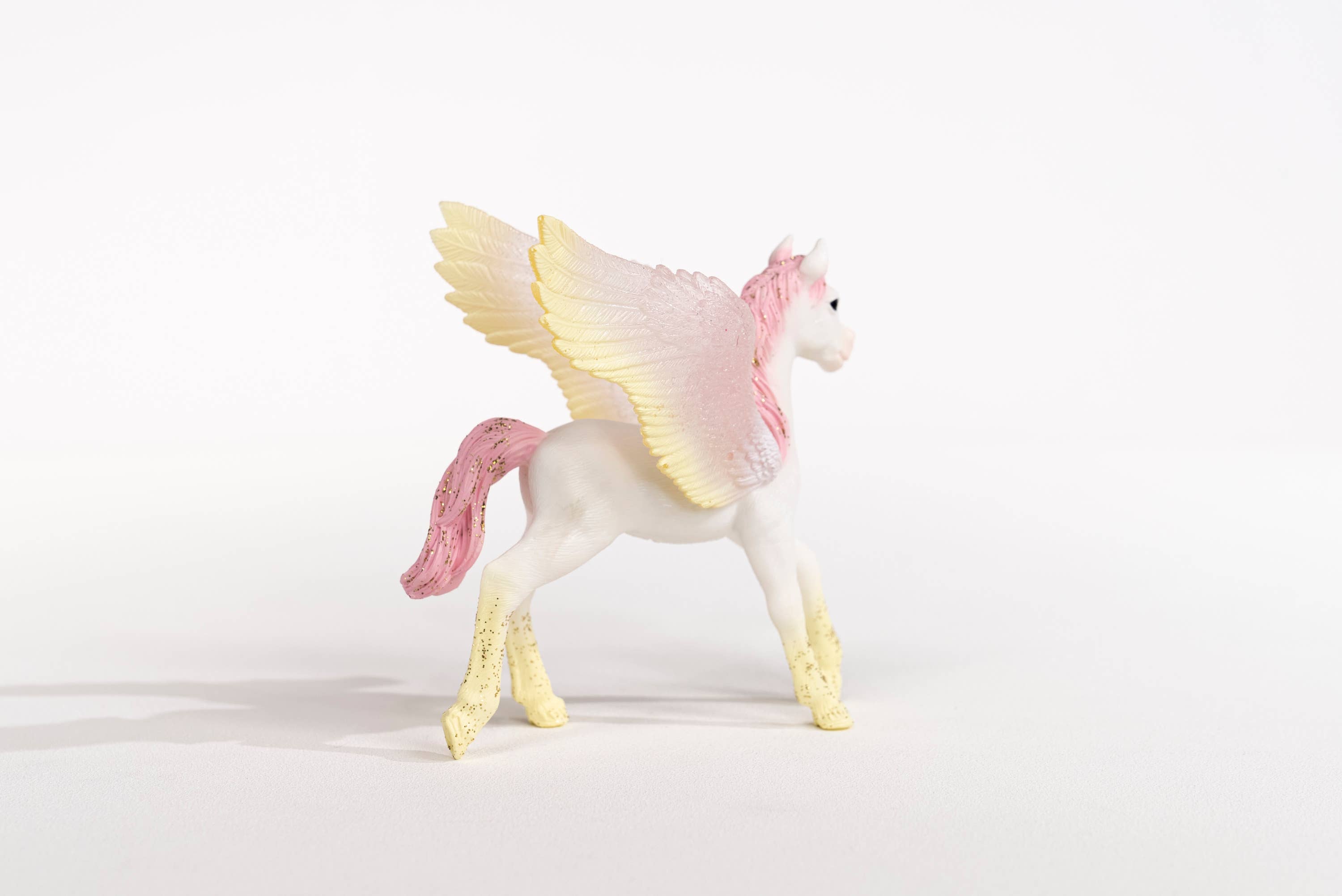 Schleich Sunrise Pegasus Foal Figurine - Toy Polloi