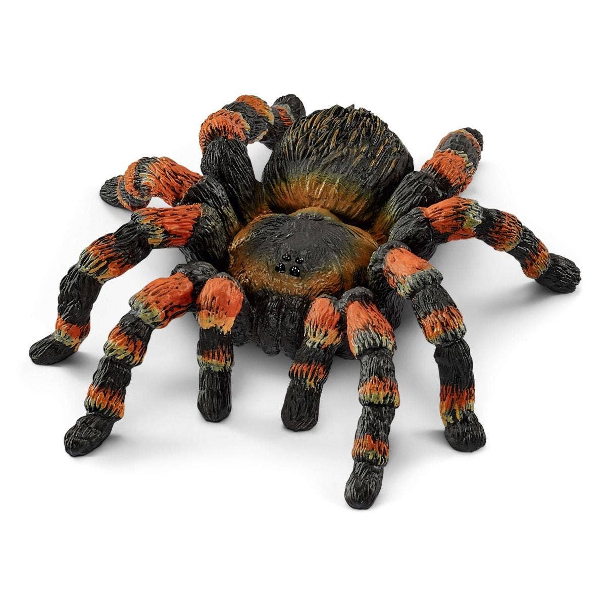 Schleich tarantula spider animal toy figurine with detailed black and brown body, realistic textured legs, on a white background.