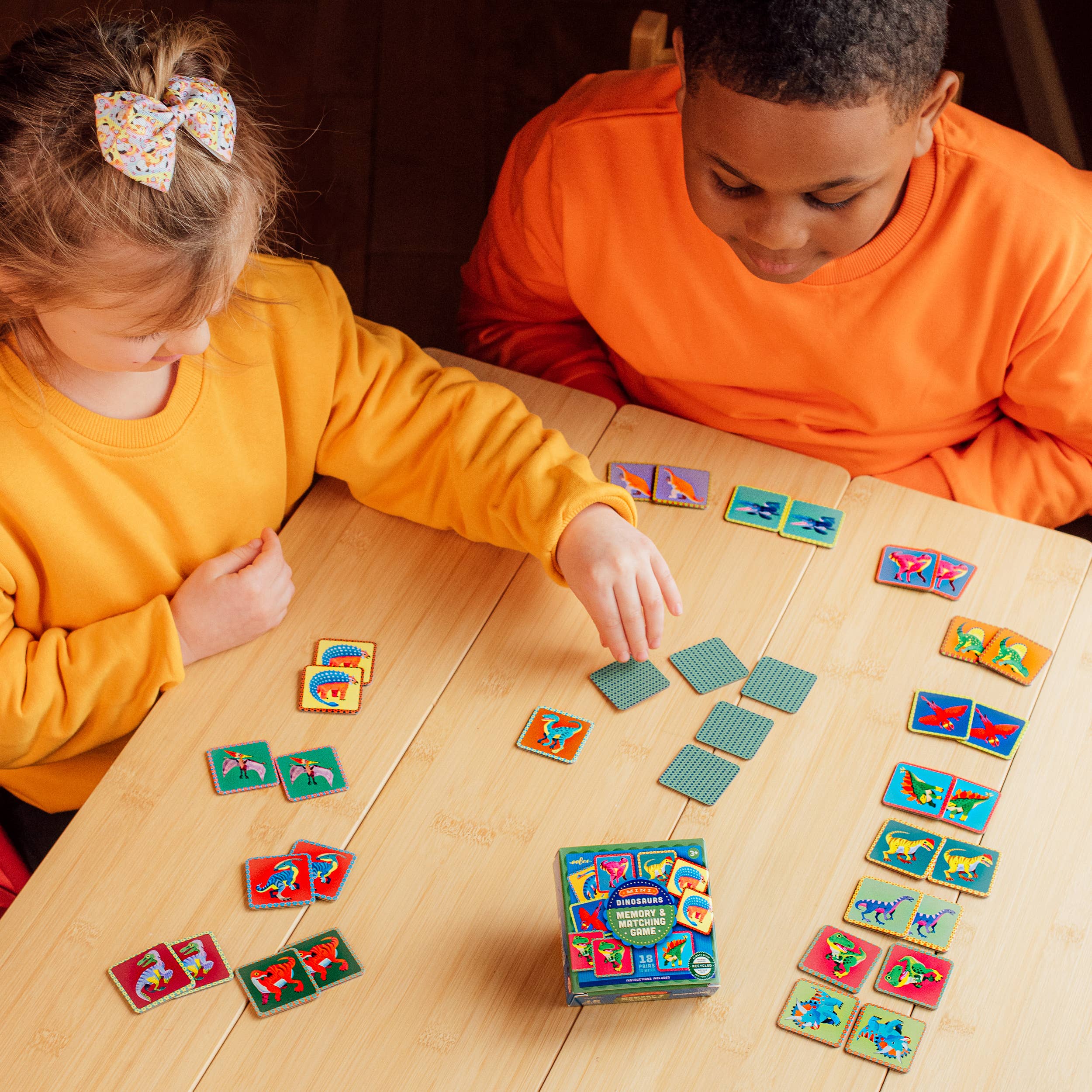 Colorful eeBoo mini memory game with matching cards featuring playful illustrations for kids' fun and cognitive development.
