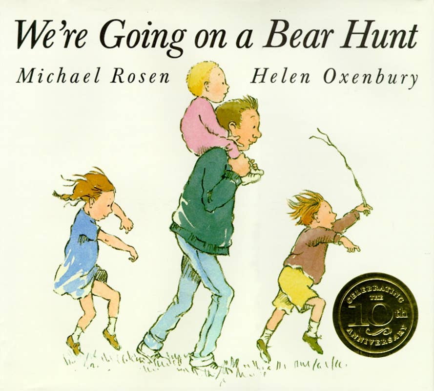 Cover image of "We're Going on a Bear Hunt" book by Michael Rosen, published by Simon & Schuster, featuring children walking through a landscape.