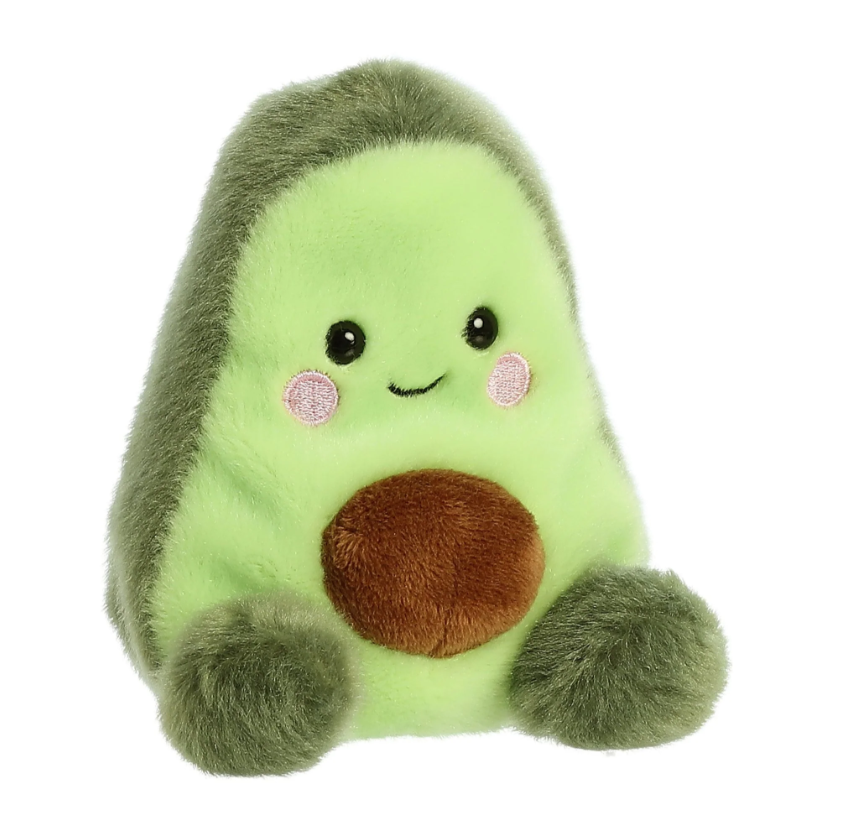 Soft avocado-shaped plush toy from Palm Pals, featuring a friendly face and plush texture, perfect for cuddling.