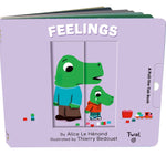 Book titled 'Feelings' with cartoon characters on a purple cover
