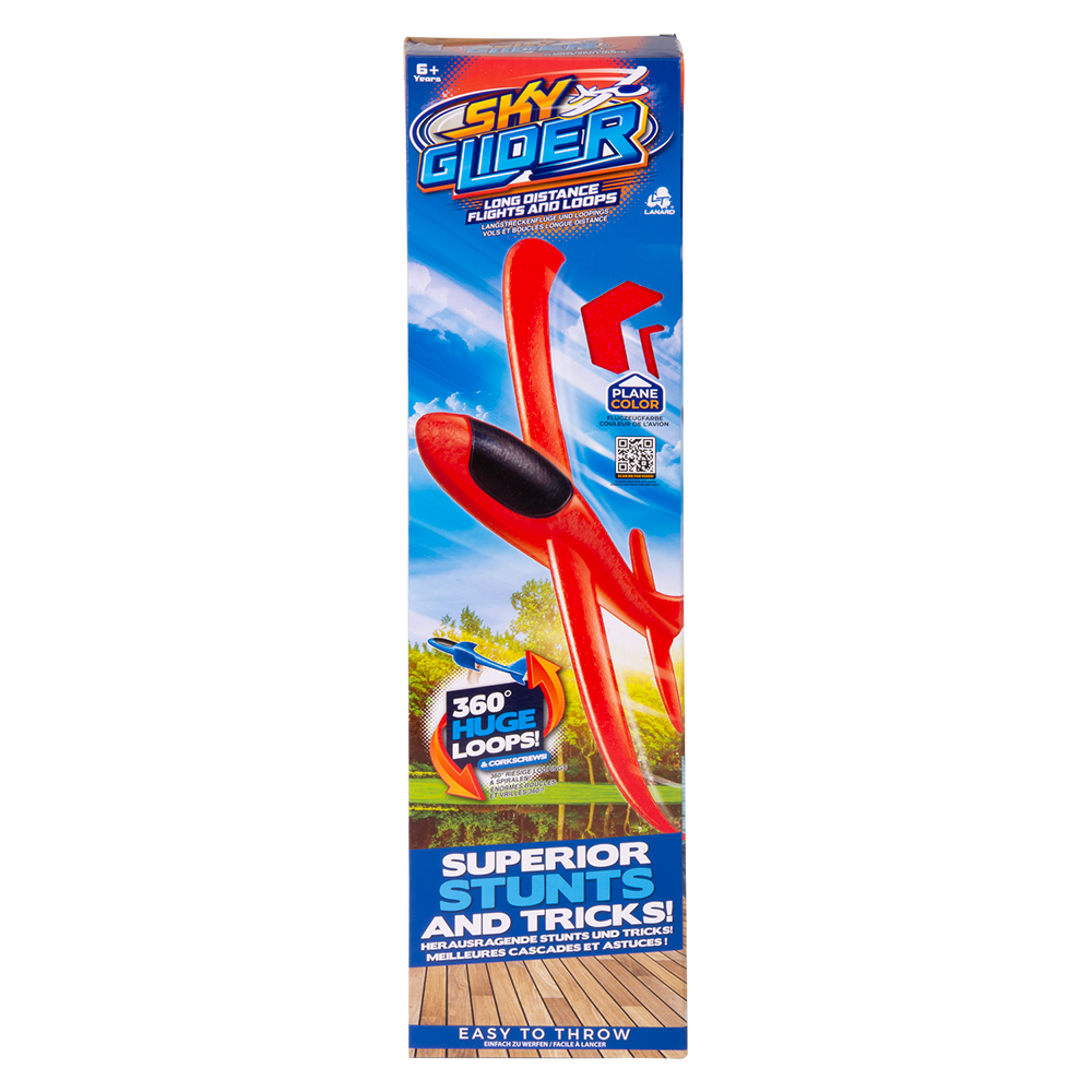 Outdoor stunt flyer sky glider by The Toy Network soaring through the sky with colorful wings in open outdoor space