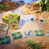 HABA USA On the Hunt for Dinos memory game with colorful dinosaur cards and game pieces for children.