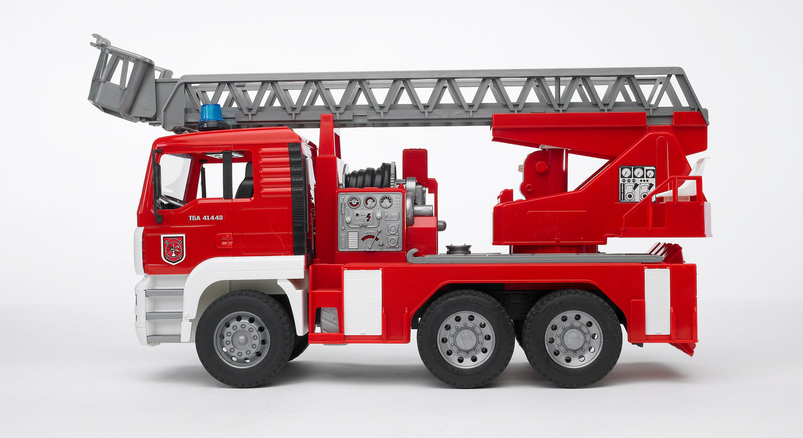 Bruder Man Fire Engine with Ladder toy truck, detailed plastic vehicle for children, featuring a red fire engine with extendable ladder.