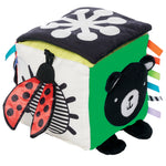 Manhattan Toy Wimmer Baby Discovery Cube with colorful toys and textures for infants, designed for sensory development.