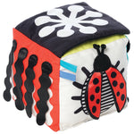 Manhattan Toy Wimmer Baby Discovery Cube with colorful shapes and soft textures for sensory play and developmental fun.