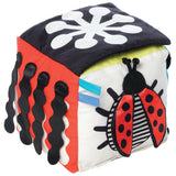 Manhattan Toy Wimmer Baby Discovery Cube with colorful shapes and soft textures for sensory play and developmental fun.